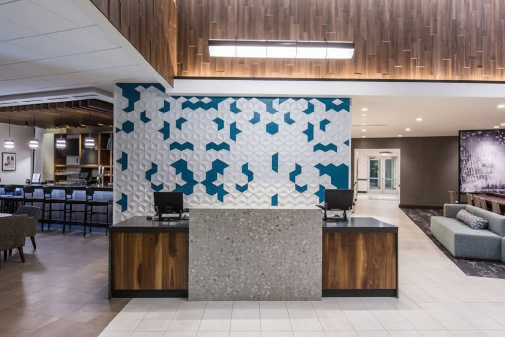 Modern office lobby with reception desk and floral wall art